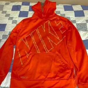 Orange Nike sweatshirt